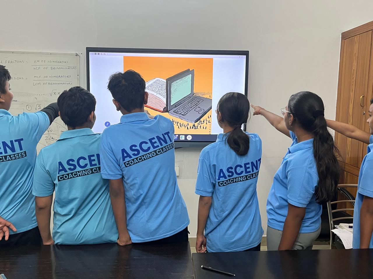 Students engaging with smart board